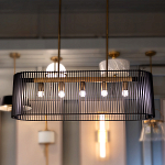 Люстра подвесная овальной формы с металлическим решетчатым абажуром матово-черного цвета и 5 лампами Kichler варинант исполнения - 7 | Loft Concept в Омске